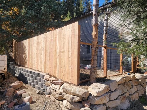 Tall Cedar Fence with Stone Foundation - Custom Design